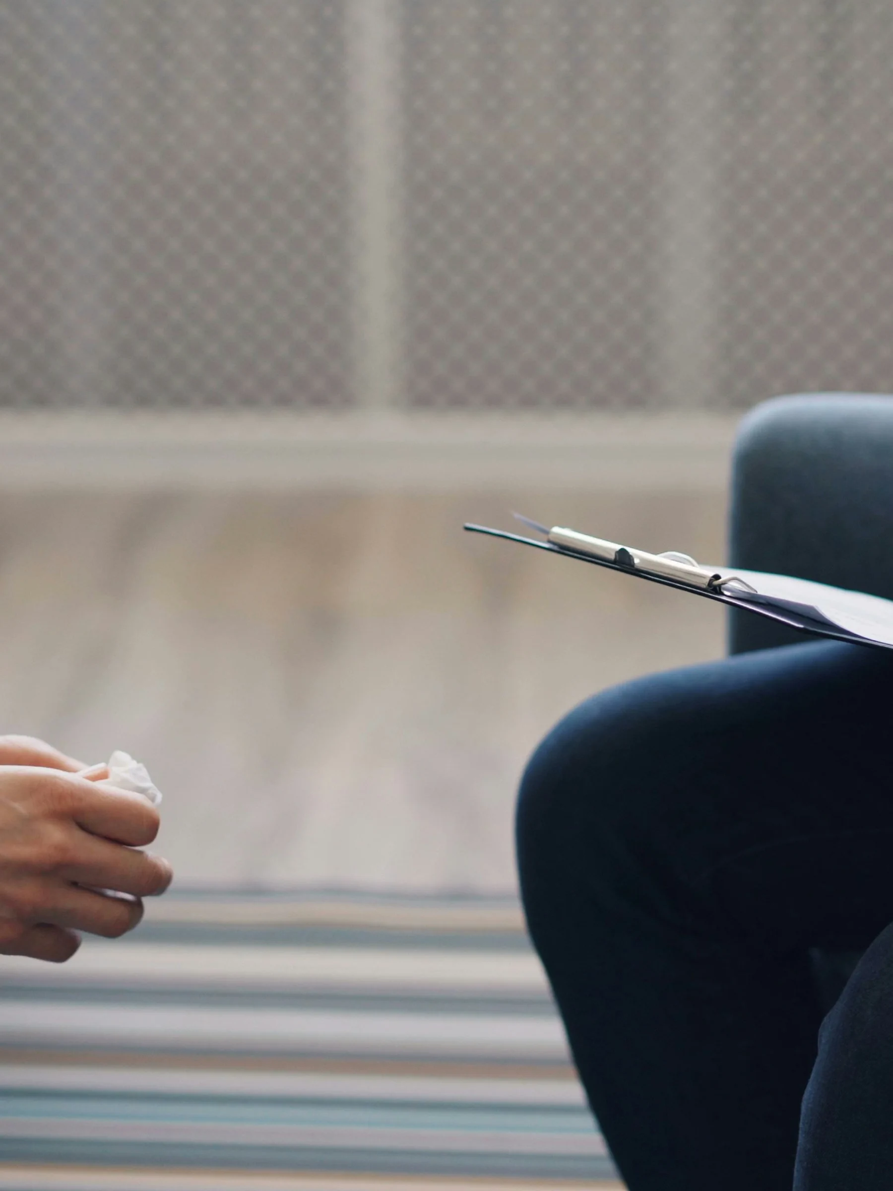 A consultation session with a clipboard and notes